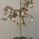 Illustration for article titled Enjoy These Clever Miniature Sculptures Made From Old Clock Parts